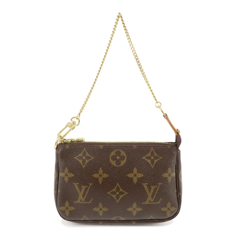 Louis Vuitton Alma bags featuring the signature top - handle designLouis Vuitton Monogram Mini Pochette Accessoires Pouch M58009