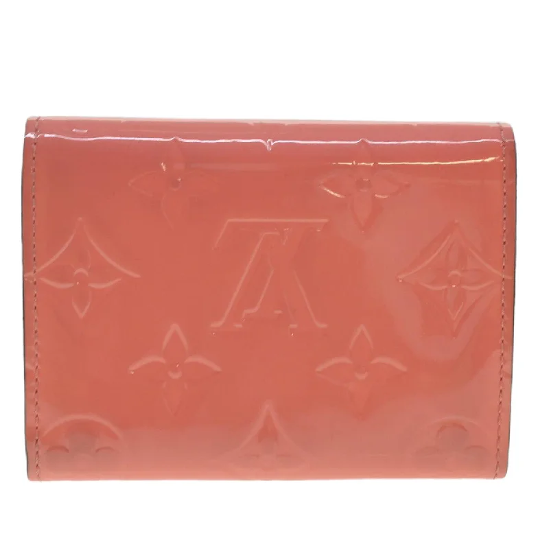 Louis Vuitton bags with a snap - button closure and a decorative charm for styleLouis Vuitton Pink Patent leather Enveloppe Carte de visite wallet accessories