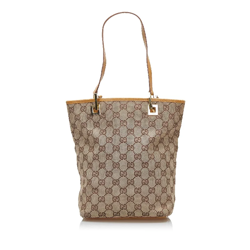 Gucci tote bags for women with a printed Gucci logoGucci GG Canvas Tote Bag