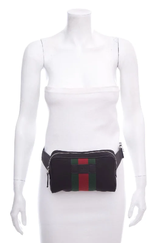 Ladies Gucci shoulder bags with a tassel decorationGucci Web Zip Around Black Belt Bag