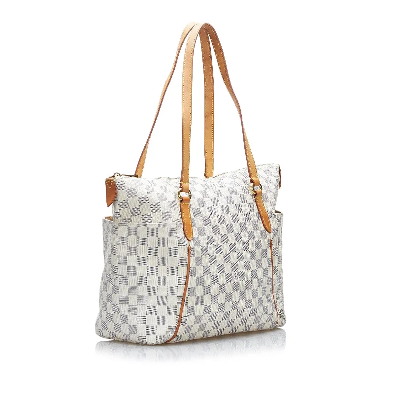 Louis Vuitton backpacks with a padded laptop compartment for travelLouis Vuitton Damier Azur Totally PM (xMBNXE)