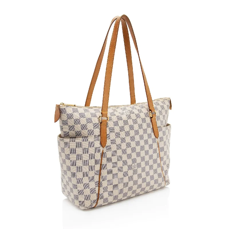 Louis Vuitton tote bags with a printed LV logo on the front for brand visibilityLouis Vuitton Damier Azur Totally MM Tote (PyDZIO)