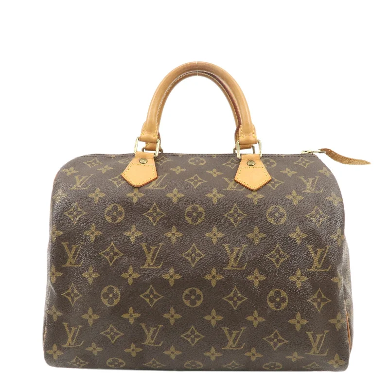 Louis Vuitton Speedy bags in monogram canvas for a classic lookLouis Vuitton Monogram Speedy 30 Hand Bag Boston Bag M41526