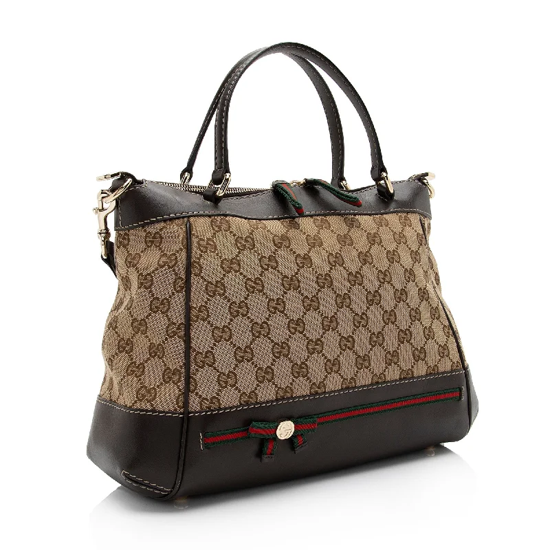 Women Gucci bags with a snap - button closure and a decorative charmGucci GG Canvas Mayfair Tote (SHF-cdridS)