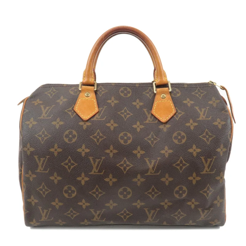 Louis Vuitton Twist bags with the iconic LV - turnlock closureLouis Vuitton Monogram Speedy 30 Hand Bag Boston Bag M41526