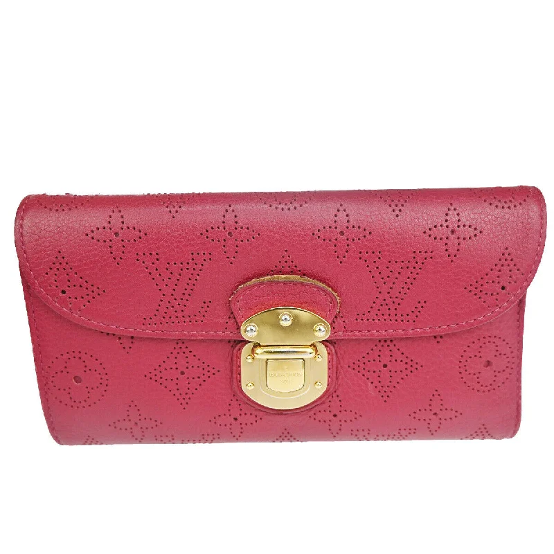 Louis Vuitton Alma bags featuring the signature top - handle designLOUIS VUITTON Amelia Wallet