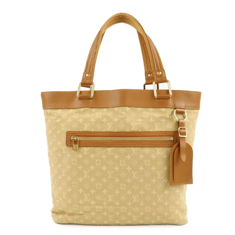 Louis Vuitton Twist bags with the iconic LV - turnlock closureLouis Vuitton Monogram Mini Lucille GM Tote Bag Beige M92683