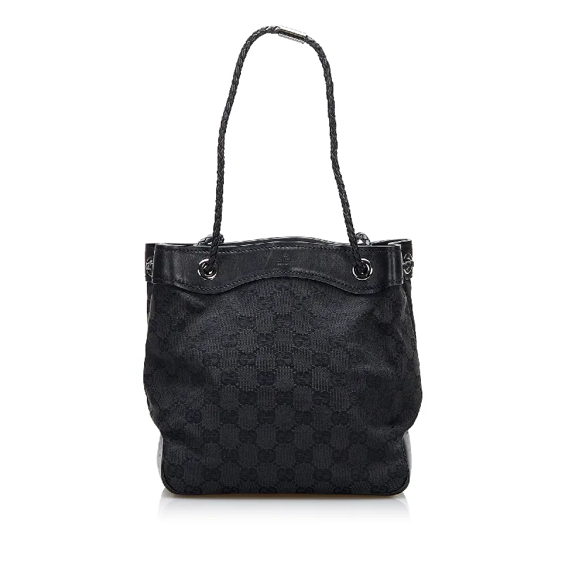 Women Gucci Sylvie bags featuring the signature web stripeGucci GG Canvas Gifford Tote Bag