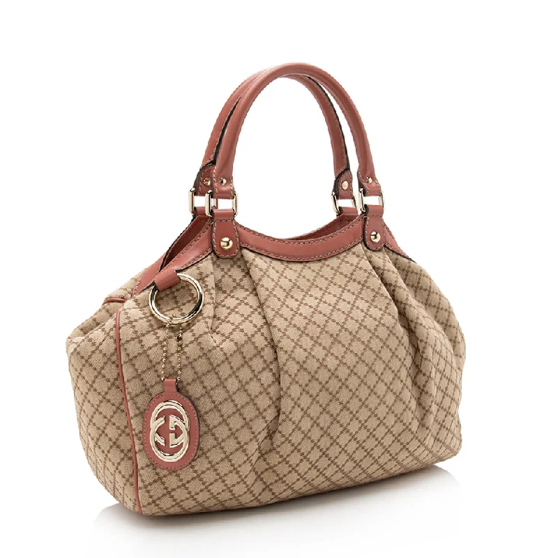 Women Gucci Sylvie bags featuring the signature web stripeGucci Diamante Canvas Sukey Medium Tote (16644)