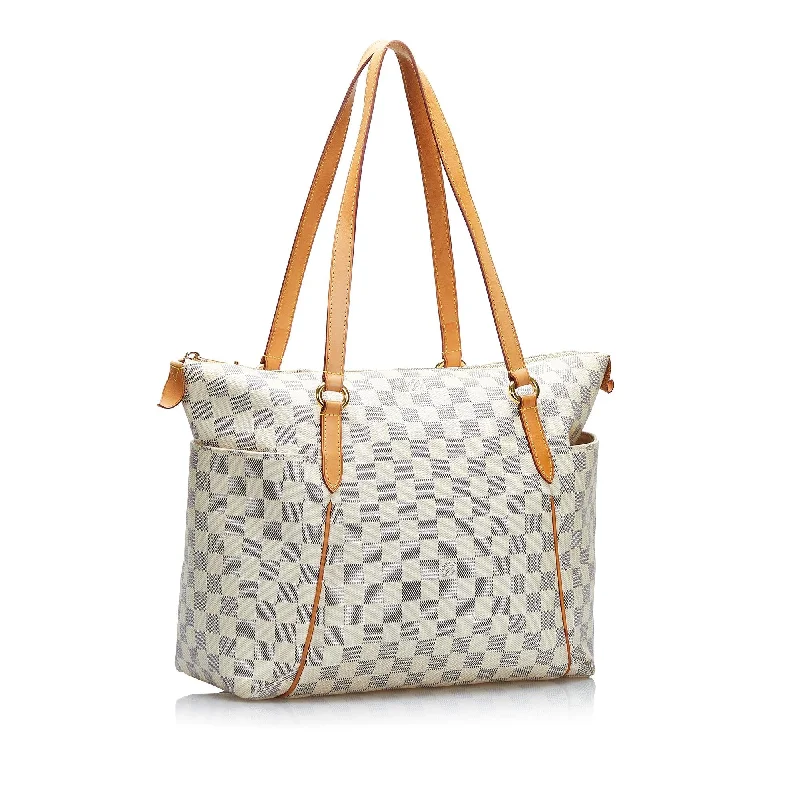 Louis Vuitton Twist bags with the iconic LV - turnlock closureLouis Vuitton Damier Azur Totally MM (ynBfFB)