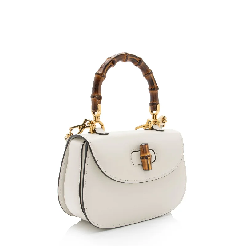 Ladies Gucci Dionysus bags with a star - shaped charmGucci Leather Bamboo 1947 Small Top Handle Bag (SHF-twXIoA)