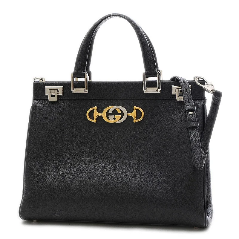 Women Gucci Sylvie bags featuring the signature web stripeGucci Zumi Top Handle Bag Shoulder Leather Black 564714