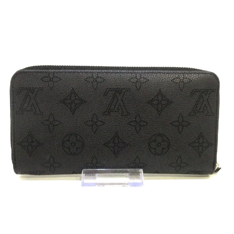 Louis Vuitton Alma bags featuring the signature top - handle designLouis Vuitton Black Leather Portefeuille zippy wallet accessories