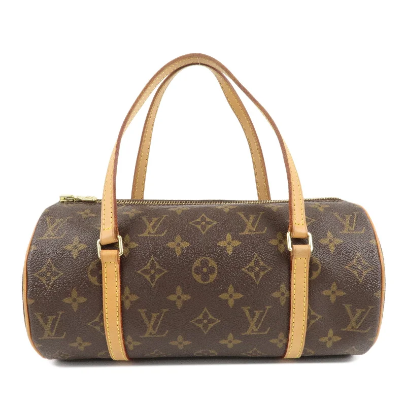 Louis Vuitton Twist bags with a crystal - embellished LV - turnlockLouis Vuitton Monogram Papillon 26 Hand Bag New Style M51386