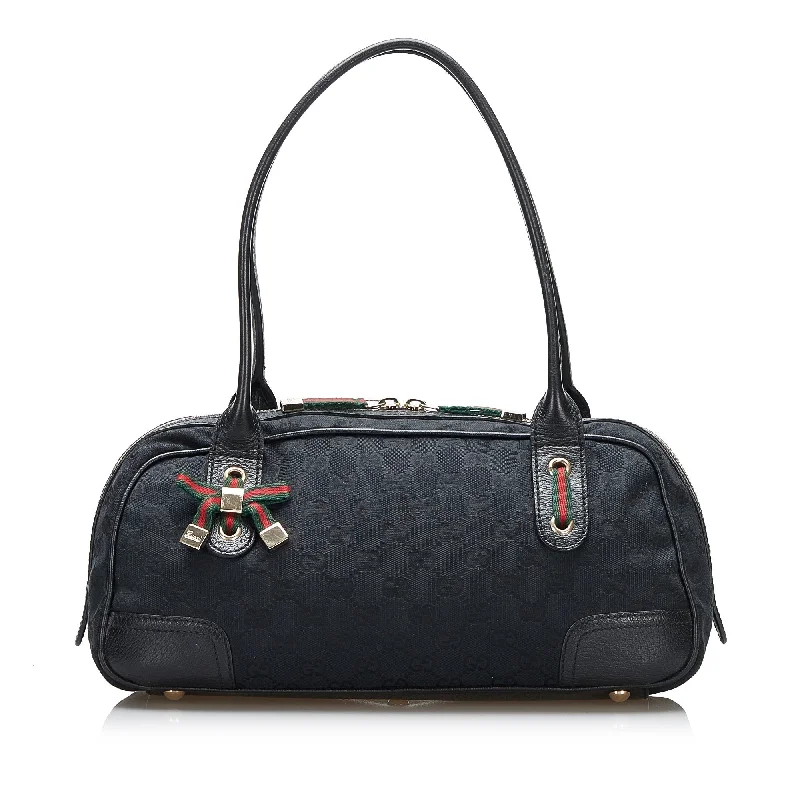 Women Gucci bags with a chain - link trim and a leather bodyGucci GG Canvas Princy Handbag