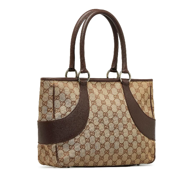 Women Gucci Sylvie bags with a monogram - embossed leatherGucci GG Canvas Tote Bag (SHG-PdWYNO)