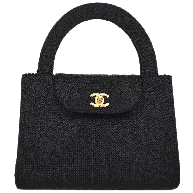 Chanel bags with exclusive seasonal releasesChanel Black Canvas Braid Handbag